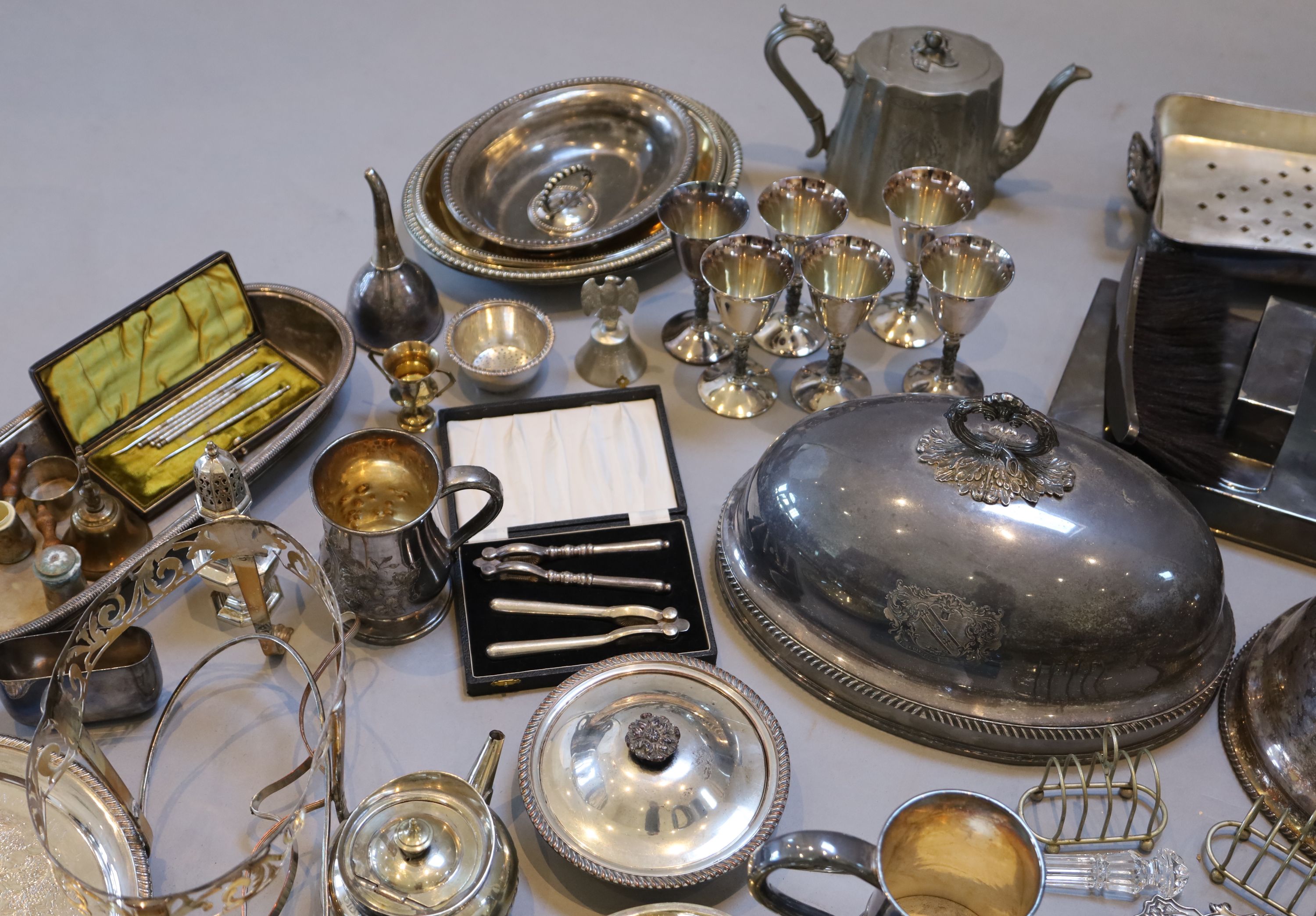 A collection of assorted plated wares,